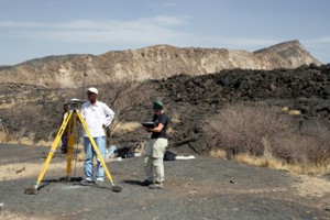 Taking a GPS measurement between lava flows in Dabbahu rift