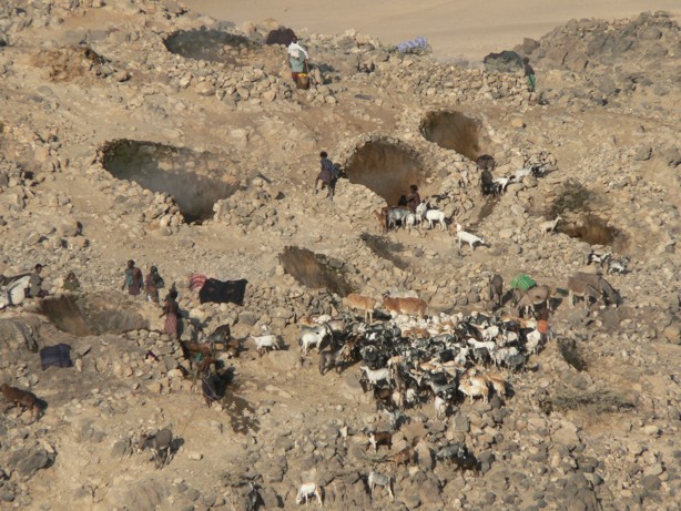 Local people collecting water from Boinas